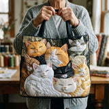 Borsa artigianale trapuntata con gattini addormentati