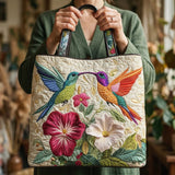 Borsa artigianale trapuntata con colibrì e fiori bianchi